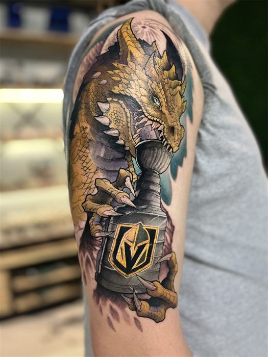 Golden dragon with a Vegas Golden Knights crest