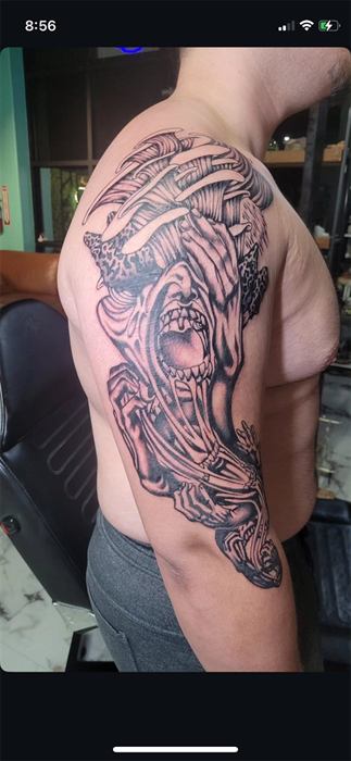 Black and grey shoulder and upper arm sleeve