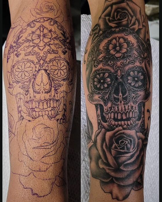 Sugar skull in black and grey, shown from two sides