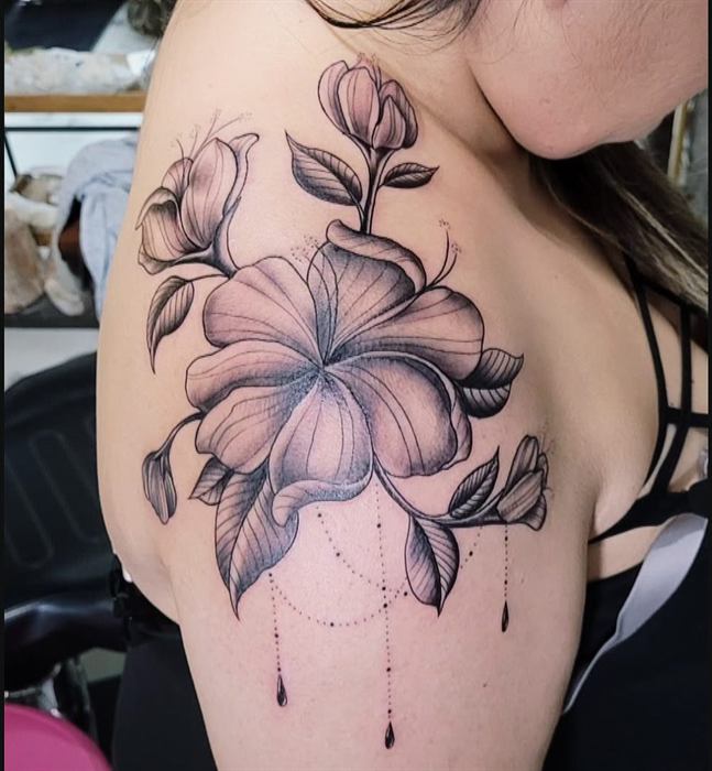 Fine line florals across the shoulder