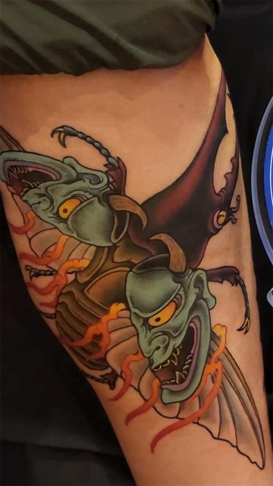 Hornet over a hannya mask in colour